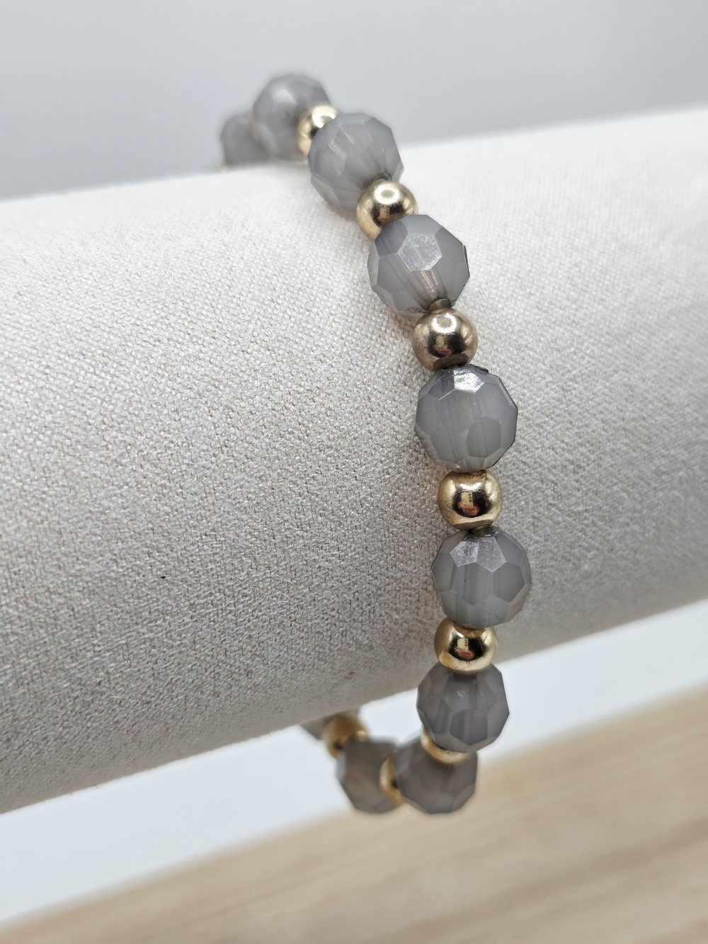 Grey Faceted Bead Stretch Bracelet with Gold Accent